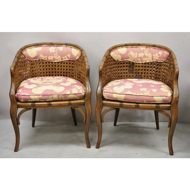 Vintage Hollywood Regency Faux Bamboo Cane Barrel Back Club Lounge Chairs (A) - a Pair. Item features cane seat and back,...