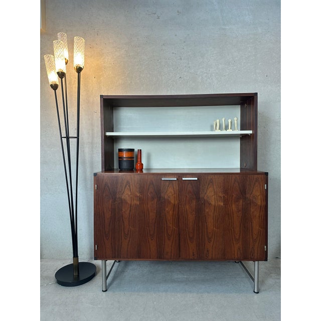 Wall cabinet from the ‘Made to Measure’ series by Pastoe. Designed by Cees Braakman in the 1950s. Walnut. Adjustable...