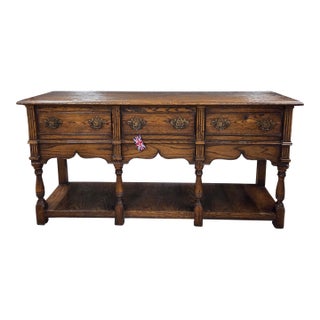 Late 20th Century Oak Three Drawer Potboard Dresser Base With Turned Legs and Shaped Frieze For Sale