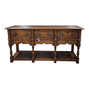 Late 20th Century Oak Three Drawer Potboard Dresser Base With Turned Legs and Shaped Frieze