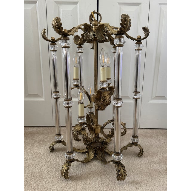 Offering for sale this stunning vintage European luminaire with the following fine features: - Made of gilded brass and...