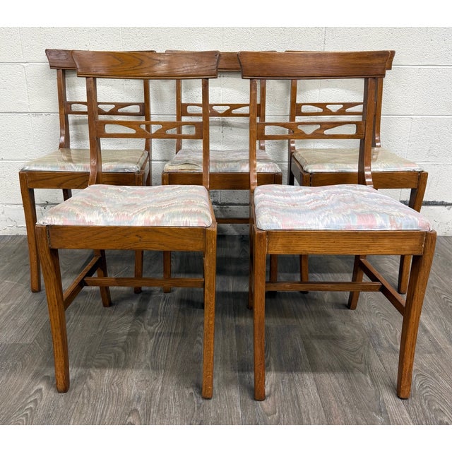 This is a stunning set of five antique American quarter-sawn oak dining chairs, crafted circa 1920 with Arts & Crafts and...