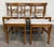 This is a stunning set of five antique American quarter-sawn oak dining chairs, crafted circa 1920 with Arts & Crafts and...