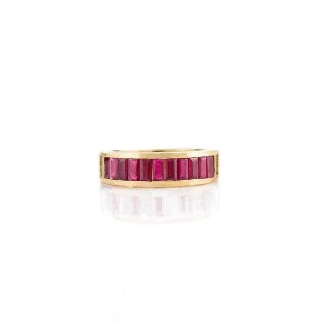 This is part of Chairish’s Fine Jewelry assortment. Baguette Cut Natural Ruby Engagement Band Ring in 18K Gold symbolizes...