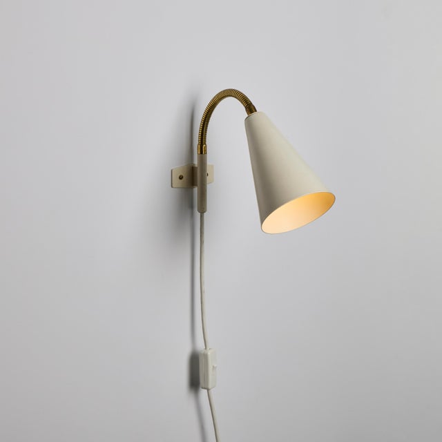 Pair of 1960s Plug-in White Conical Brass &amp; Metal Wall Lamps Attributed to Hans Agne Jakobsson&nbsp; An functional...
