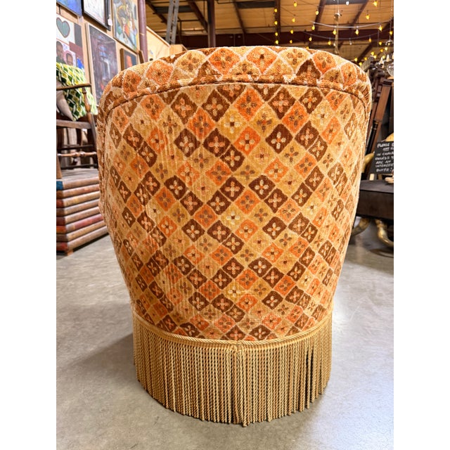 Quaint and graphic but very sweet orange patterned antique French Napoleon III crapaud or toad tub-style chair with...