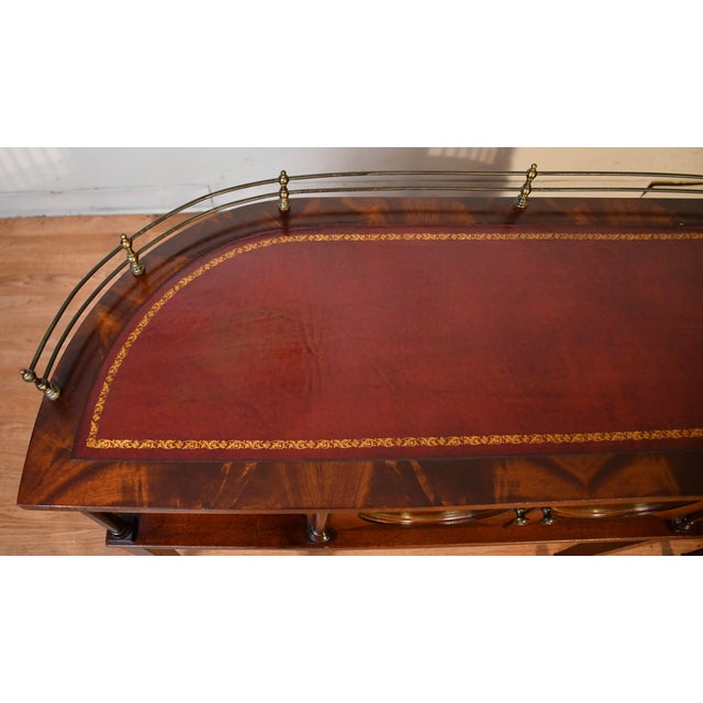 We are pleased to offer this beautiful English Regency console table, from the 1930s. This console is made of mahogany...