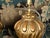 A pair of Italian carved giltwood fragments from the 19th century made into table lamps and mounted on custom lucite...