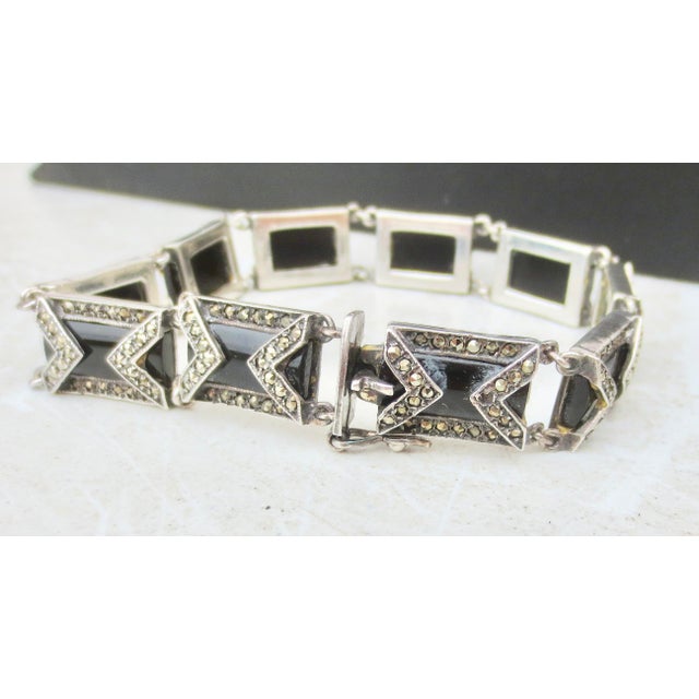 Art Deco marcasite-and-onyx link bracelet. High-style Art Deco design pattern. marked Sterling and with a jeweler's mark...