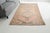 Add a touch of timeless elegance and warmth to your home with this beautiful, hand-knotted vintage Turkish rug. Featuring...