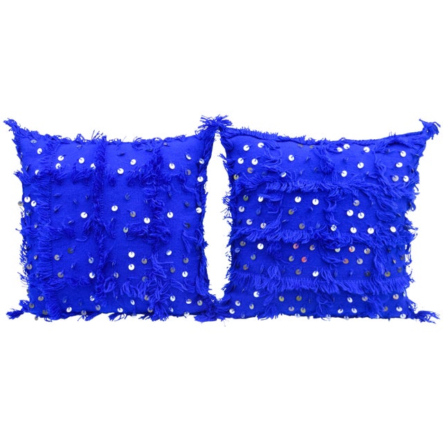 Fabulous pair of vintage pillows handwoven by the Berbers in the High Atlas Mountains of Morocco. Exhibiting a lively and...