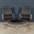 A pair of iconic ea117 office chairs designed by charles and ray eames, produced by vitra in the late 20th century. One of...