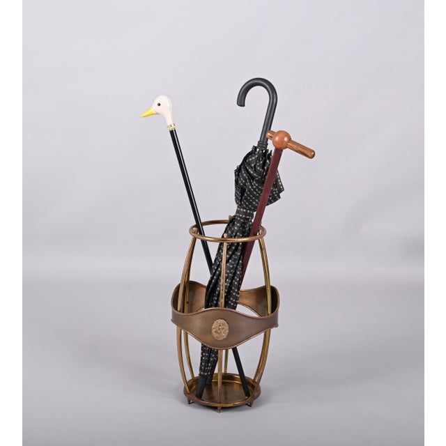 Midcentury brass barrell-shaped umbrella stand and cane holder. This fantastic piece was designed in Italy during the...