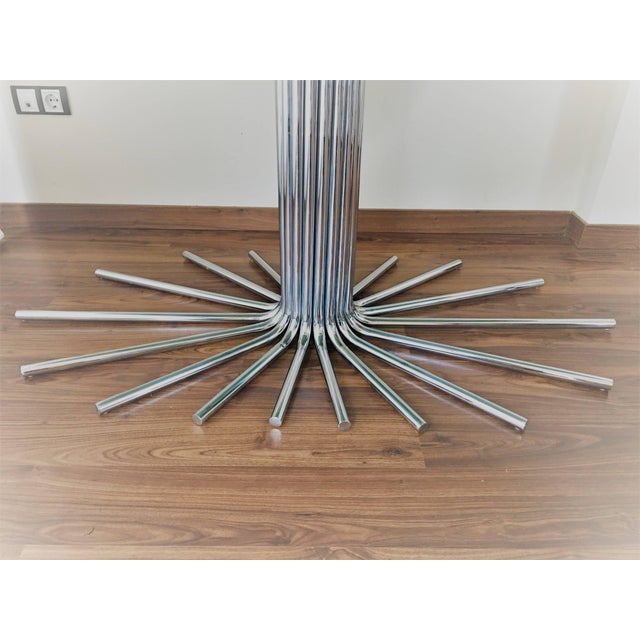 Midcentury chrome star base table with smoked glass Oval top in the manner Gastone Rinaldi. Chrome in nice condition....