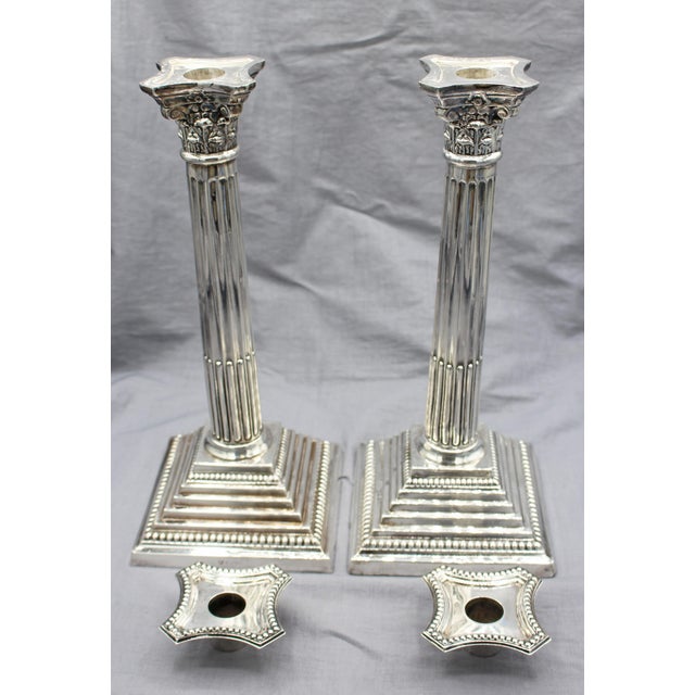 Pair of English sterling silver candlesticks, English, 1966. Corinthian Column traditional form. Hebrew inscription on...