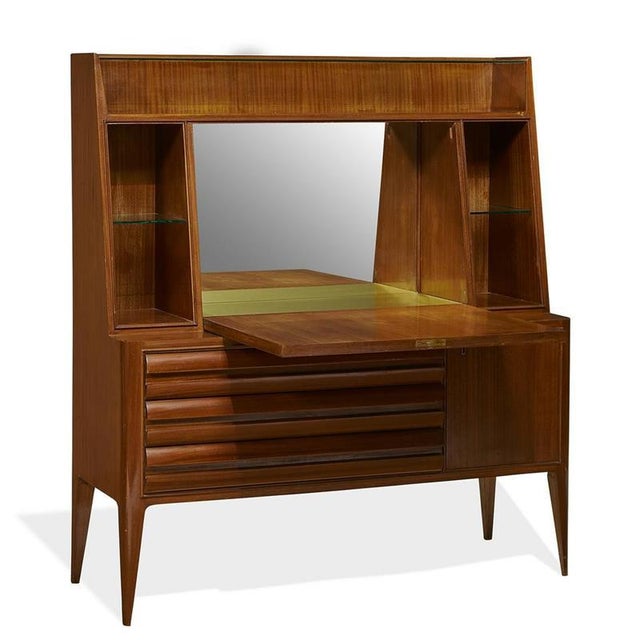 Italian Cabinet in the style of Gio Ponti. For the details in this cabinet it could have actually been designed by Gio...