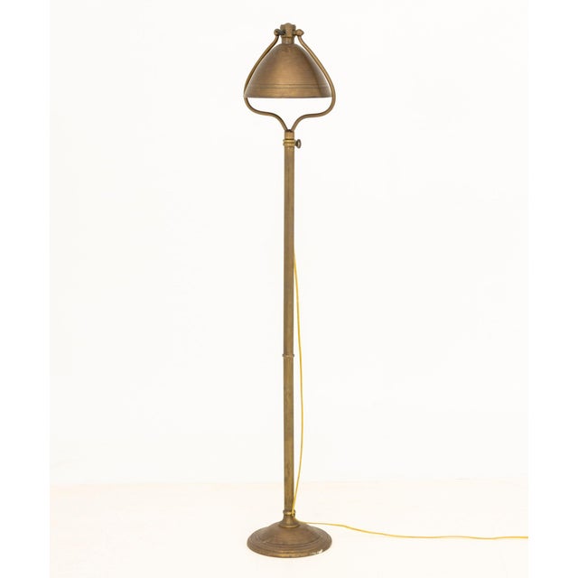 Bradley and Hubbard Brass and Iron Floor Lamp, with articulated lamp shade, marked "Bradley &amp; Hubbard Mfg. Co." to...