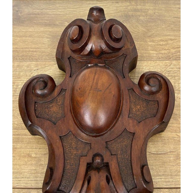 Enhance your interior with this Antique French Pediment, beautifully crafted from walnut and featuring elegant hand-carved...
