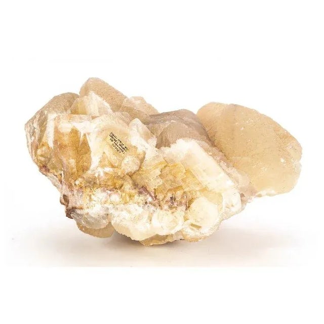 Heavily striated calcite mineral specimen collected from Taffs Well Quarry, Cardiff in 1931. This cream to yellow colored...