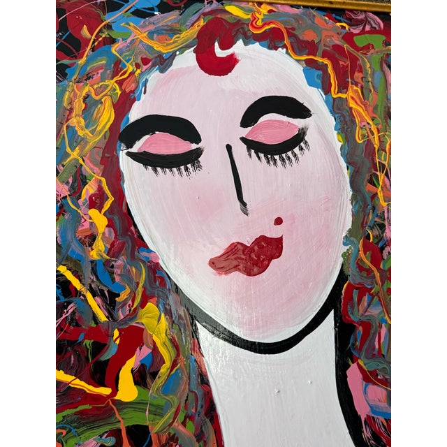 A vibrant and emotive original painting by artist Thomas Pulgini, this work captures a dreamlike female figure with eyes...