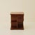 Swedish Art deco side table from the 1940's in richly figured wood veneer. The square-form cabinet is raised on a stepped...