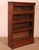 Elegant Globe Wernicke London oak bookcase from the late 19th/early 20th century, England, comprising four sections. This...