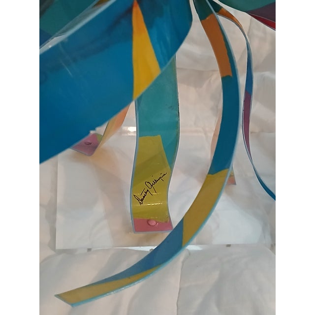 Vibrant hand-signed abstract metal sculpture by celebrated American artist Dorothy Gillespie. This dynamic three-...