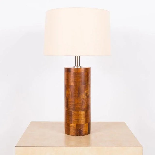 Tall wood block column lamp with linen shade by Amter Craft. Dimensions listed (16 in. diameter x 29 in. tall) are the...