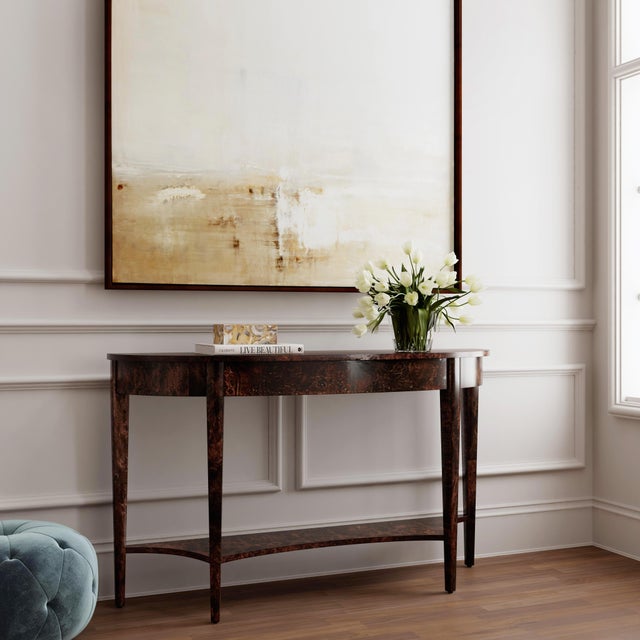 This wide Demilune Console Table features a stunning finish over solid wood and beautifully grained cherry veneers. Its...