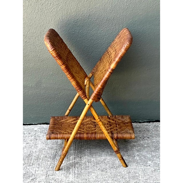 An extraordinary piece of mid-20th-century organic design, this vintage folding newspaper holder blends artisanal weave...