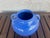 I believe this is a beautiful piece of glossy blue double handle art pottery and is in the style of Zanesville or Ohio...