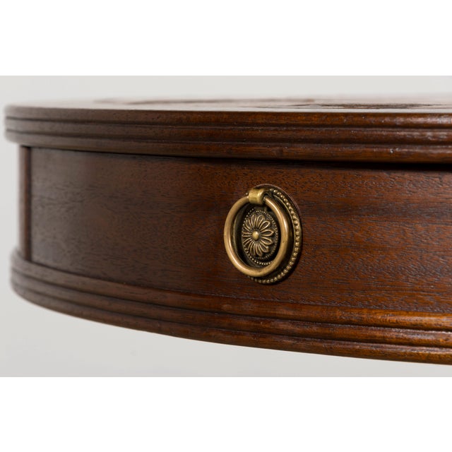 Sourced in Provence, France, this early 20th-century Regency Revival center table draws inspiration from the refined...