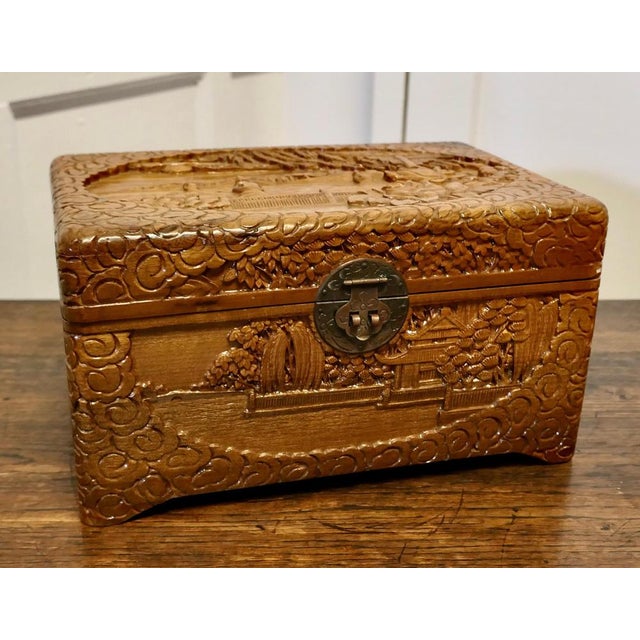 Oriental carved camphor wood chest, jewellery coffin. This beautiful carved chest is made from camphor wood, for those of...