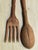 This is a fantastic French country hand carved fork and spoon that are intended to be a salad serving set but I see them...
