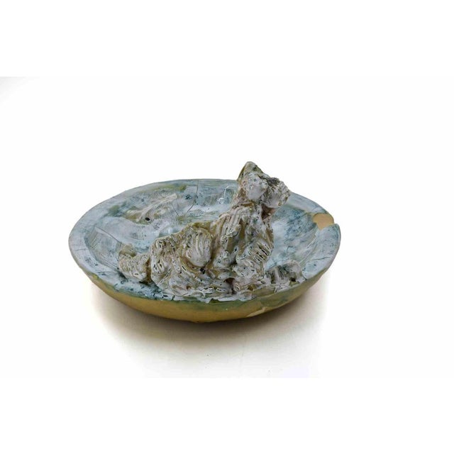 Painted ceramic sculpture realized by sirio pellegrini in 1960s. Good condition except for a minor chip on one of the...