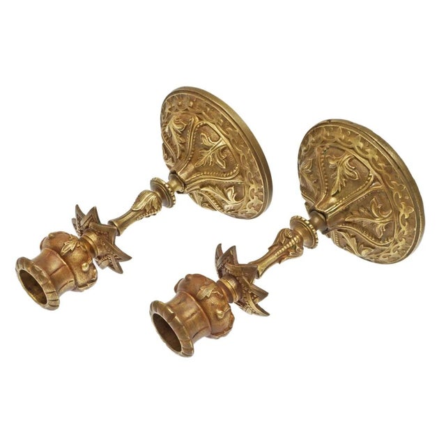 Lovely pair of antique English bronze candlesticks bearing a design registration dated June 2, 1863. Graceful in...