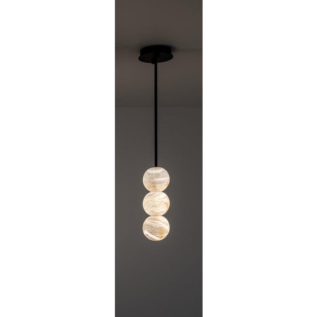 Raim pendant lamp with 3 spheres by united alabaster dimensions: ⌀ 12 cm x h 36 cm (customizable height) materials:...