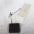 - Table lamp with a steel construction and a cast iron base - Shade is made of perforated metal - Fitted with one E27 bulb...