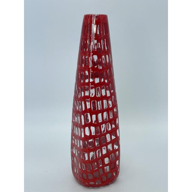 Sculptural glass vase from the iconic Occhi series, designed by Tobia Scarpa for Venini. The design thrives on the...