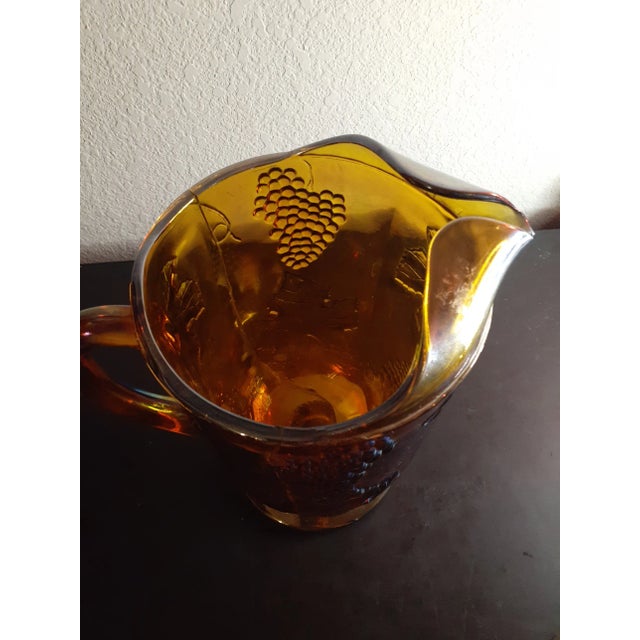 This is a vintage 1970 Indiana Glass Marigold Carnival Glass Grape Pattern LARGE 11" Pitcher. Procured at auction BOX 22