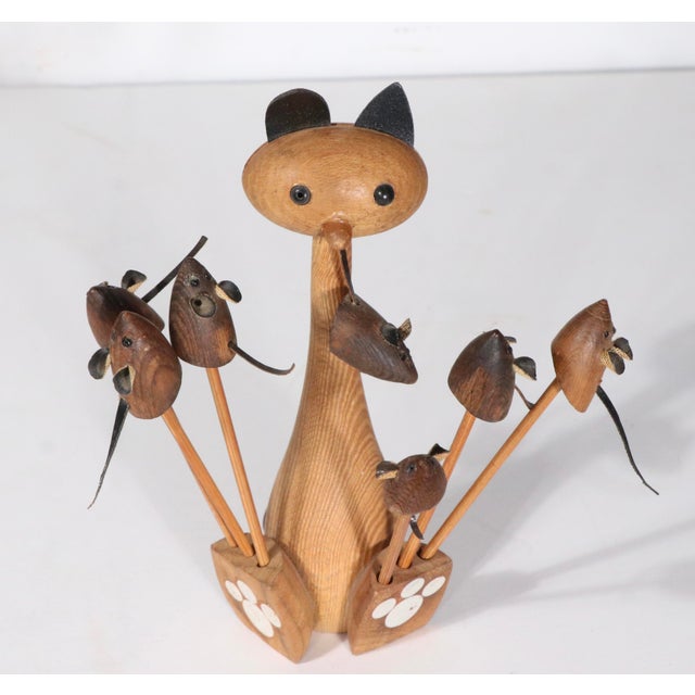 Whimsical Mid Century carved wood cat and mouse cocktail Hor d'oruvres set, having a seated cat with six mouse themed...