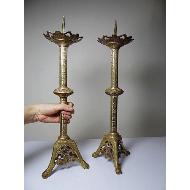 A beautiful pair of large church candlesticks, altar ornaments, in gilt bronze, French work from the 19th century in the...