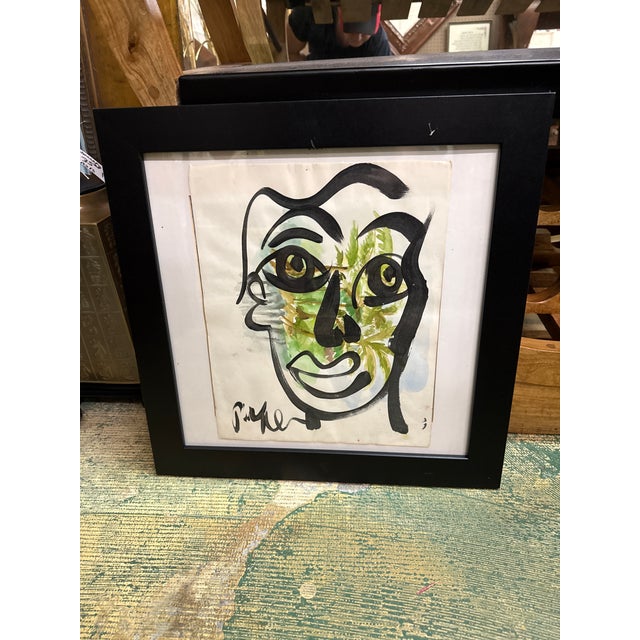 Fantastic pair of colorful abstract paintings by Peter Keil. painted on paper and depicts a cubist face in black with...