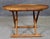 Round dish shaped coffee table made by Mogens Lassen for Carl Hansen & Son. Featuring a beautiful 'x' base in teak wood...