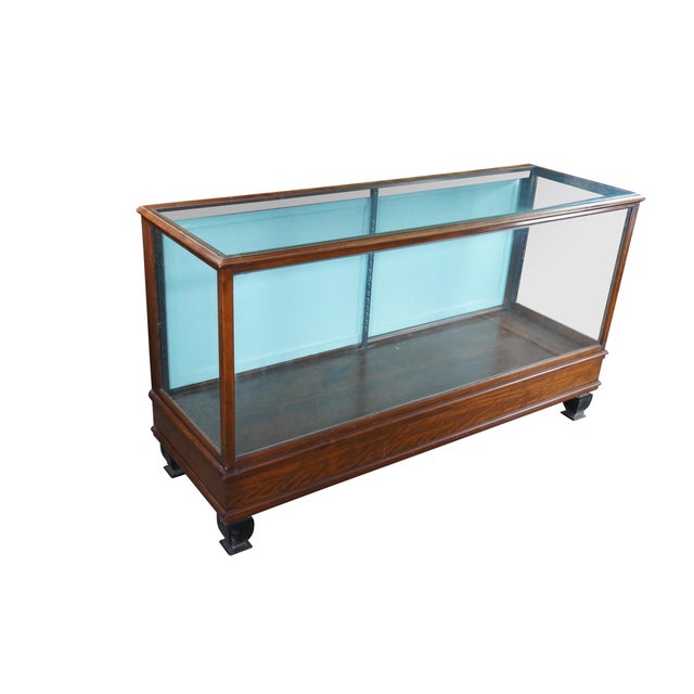 An antique general storage showcase made by The Grand Rapids Store Equipment Corporation of Grand Rapids, Michigan....