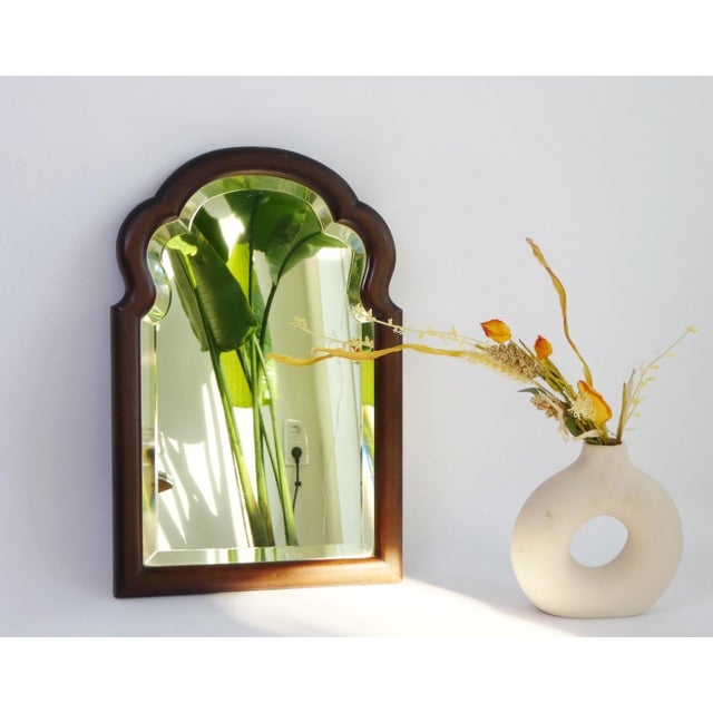 Small antique wooden wall mirror with a beautiful scalloped frame made out of oak. The mirror dates back to the 19th...