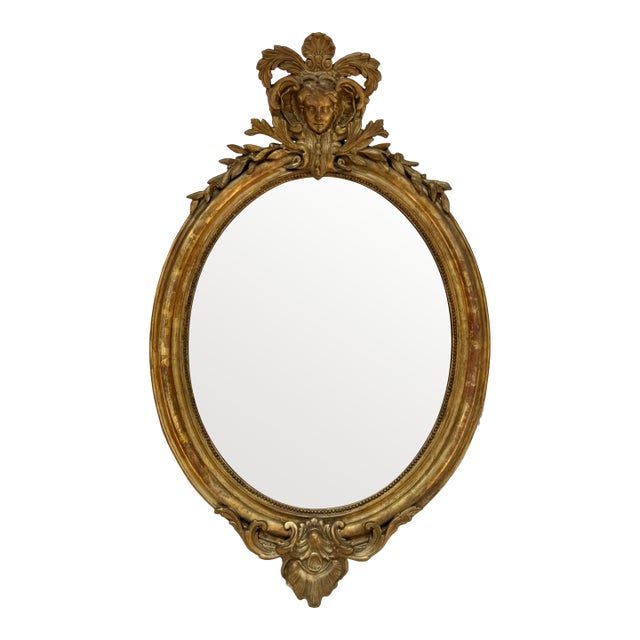 19th Century French Louis XVI Style Carved and Giltwood Oval Mirror For Sale