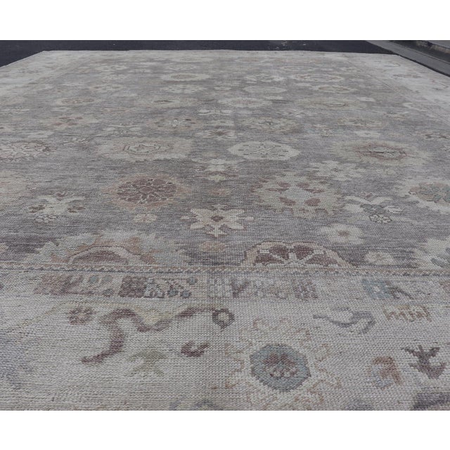 Large Turkish Oushak Rug in Soft Gray, Ivory, and Taupe With Floral Motifs For Sale - Image 9 of 16