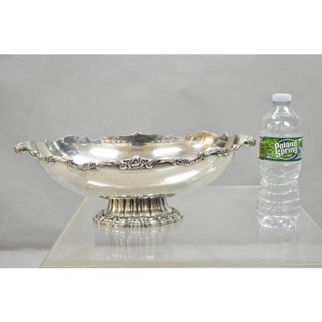 Vintage Victorian Silver Plated Oval Pedestal Centerpiece Fruit Bowl By Lunt. Circa Mid 20th Century. Measurements: 5" H x...