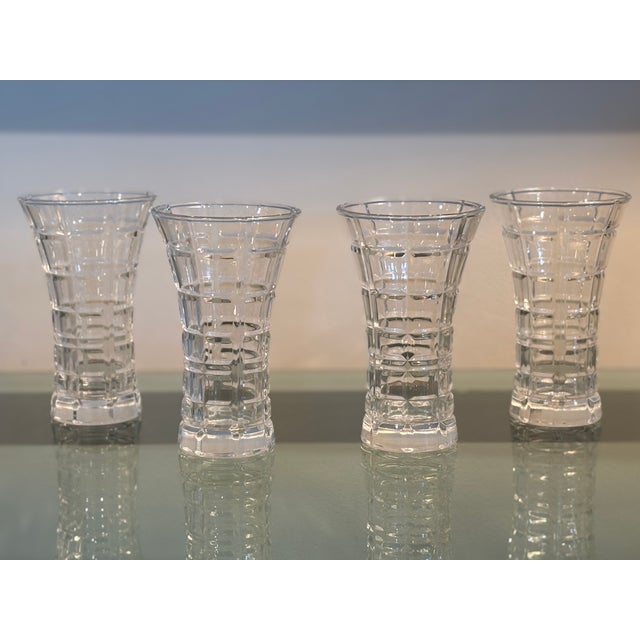 Cute set of four vintage cut glass vases with a geometric pattern. Perfect to scatter around the dinner table or on...